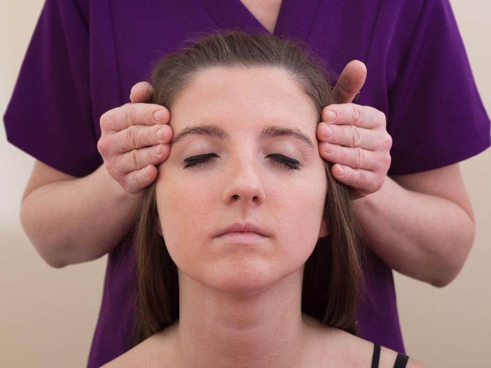 Jenny massaging the scalp during an Indian head massage at The Tranquility Zone, Monifieth, Dundee